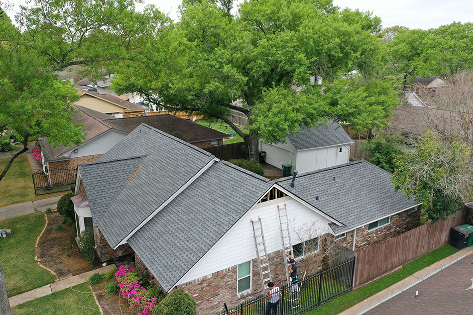 Completed asphalt shingle roof installation by Lone Star Roofing - Project 3