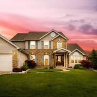 Two-storey brick home in Cypress, TX with a new asphalt shingle roof