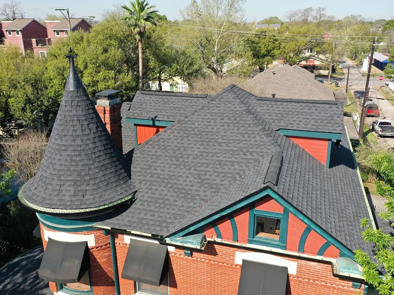 Close-up of a new charcoal asphalt shingle roof installed by Lone Star Roofing in Houston Texas